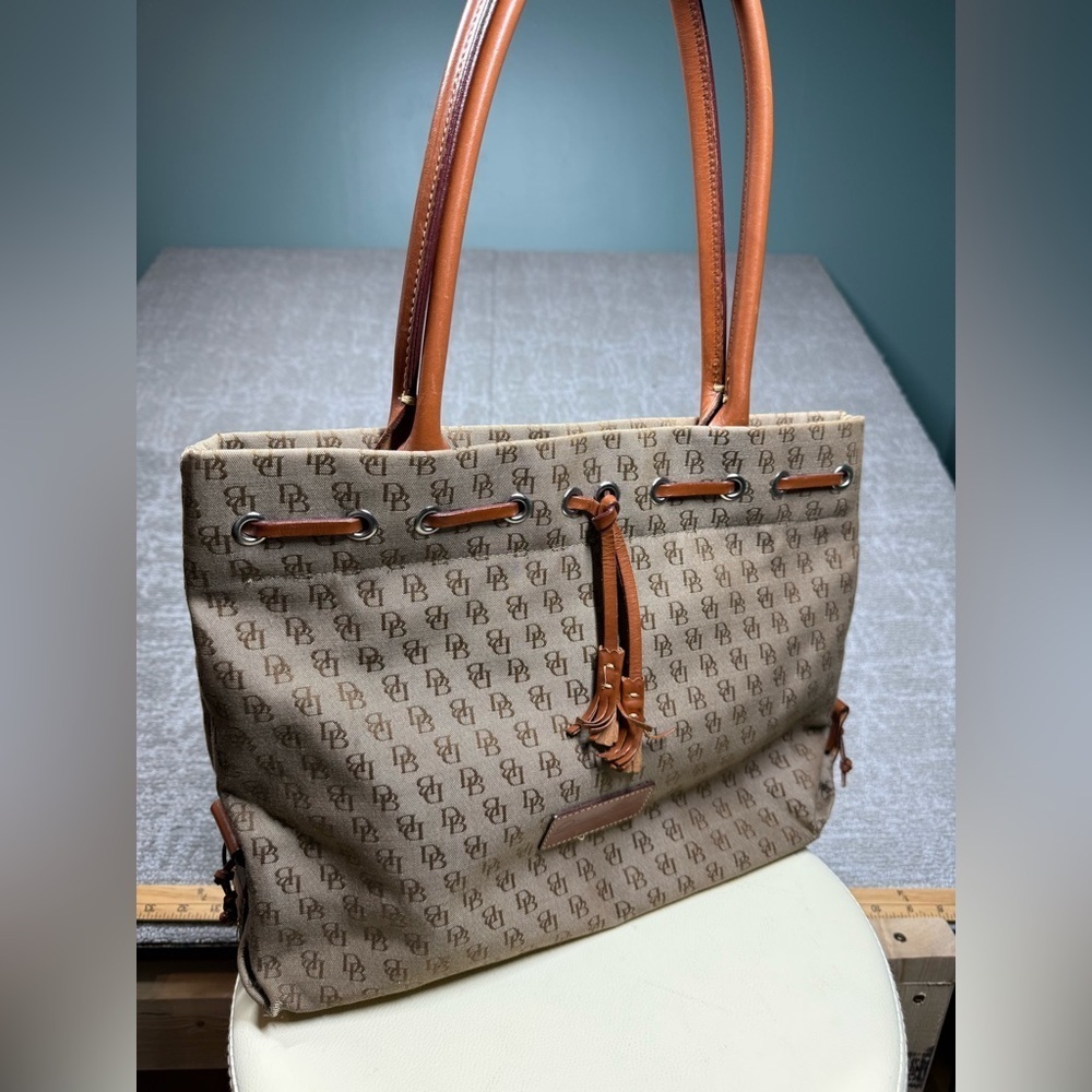 Dooney and Bourke Signature Canvas Tassel Tote